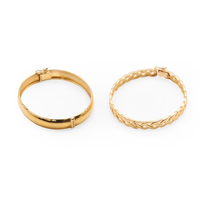 Lot 193 - Two 9ct gold bangles