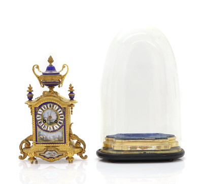 Lot 205 - A French ormolu and painted porcelain mantel clock
