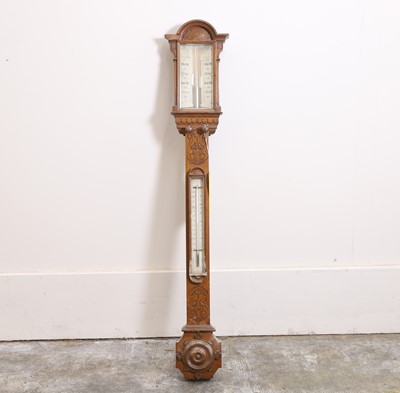 Lot 210 - A Victorian oak barometer