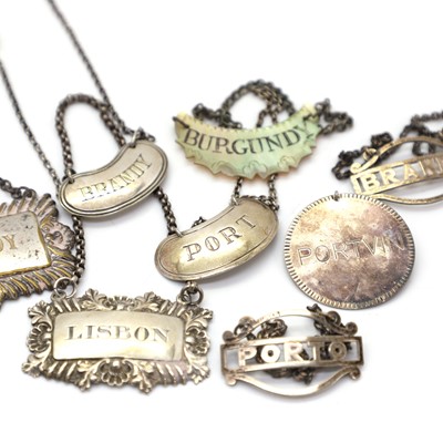 Lot 1 - A group of four silver spirit labels