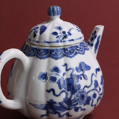 Lot 36 - A Chinese blue and white teapot and cover.