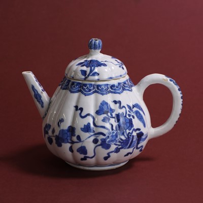 Lot 36 - A Chinese blue and white teapot and cover.