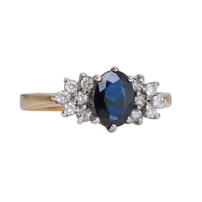 Lot 73 - A 9ct gold sapphire and diamond cluster ring