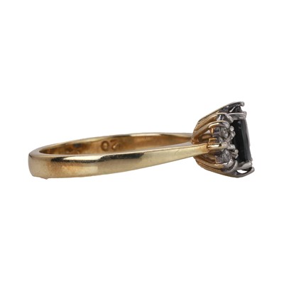 Lot 73 - A 9ct gold sapphire and diamond cluster ring