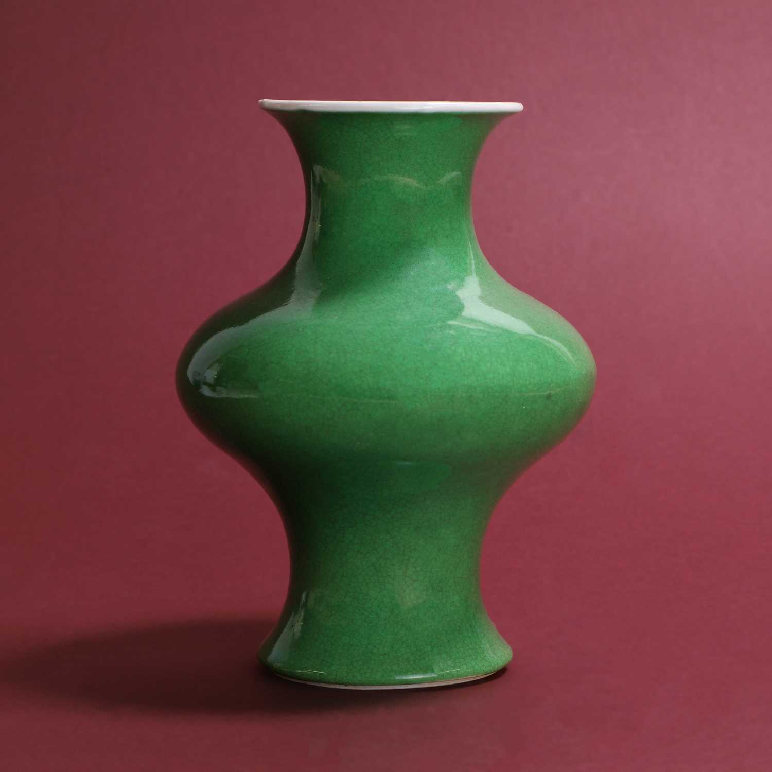 Lot 61 - A Chinese green-glazed vase