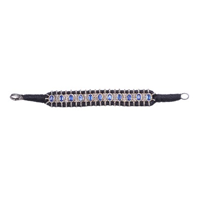 Lot 1144 - A silver kyanite and diamond bracelet