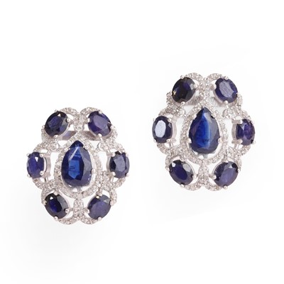 Lot 1128 - A pair of silver sapphire and diamond stud earrings
