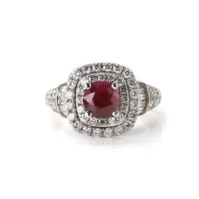 Lot 203 - A ruby and diamond cluster ring