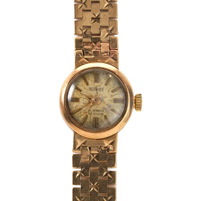 Lot 373 - A 9ct gold Turnex mechanical bracelet watch