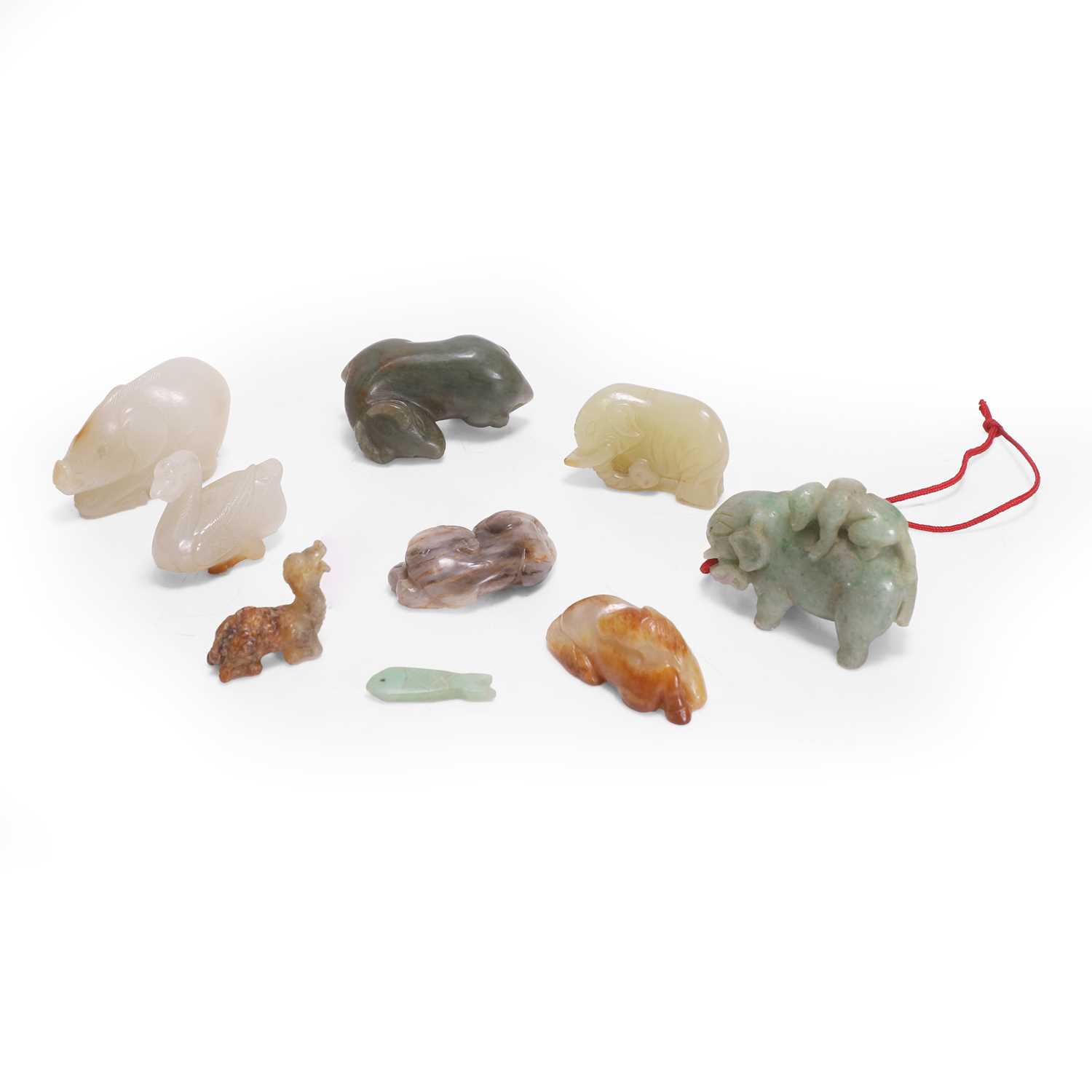 Lot 216 - A collection of Chinese jade and hardstone carvings