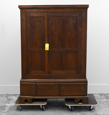 Lot 503 - A George III oak cupboard