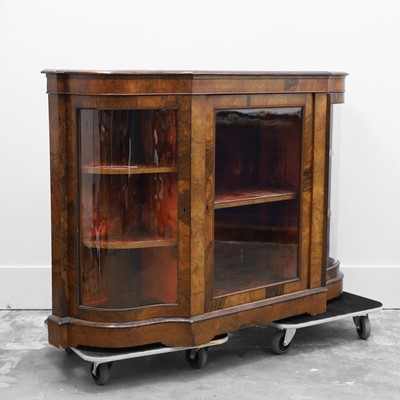 Lot 502 - A Victorian walnut serpentine glazed credenza