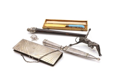 Lot 7 - A collection of silver and white metal items