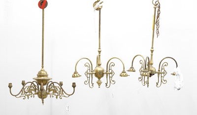Lot 474 - A group of three brass chandeliers