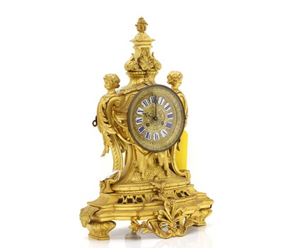 Lot 209 - A French gilt metal mantel clock