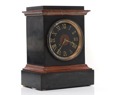 Lot 202 - A French black slate and rouge marble mantle clock