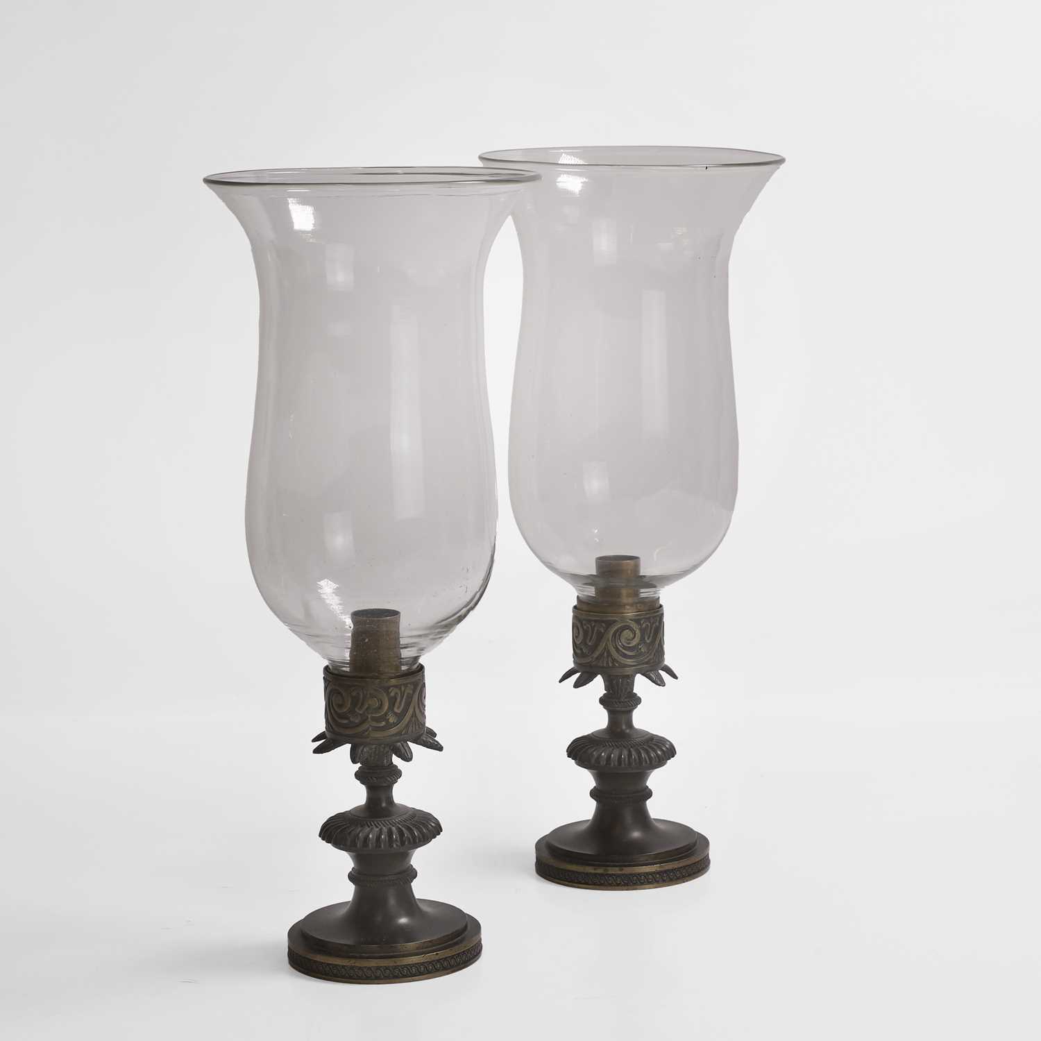 Lot 33 - A pair of Regency bronze and glass storm lamps