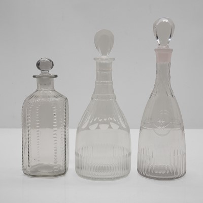 Lot 155 - Three George III glass decanters