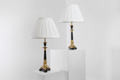 Lot 183 - A pair of Empire-style gilt and patinated bronze table lamps