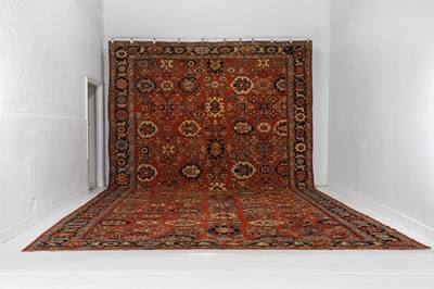 Lot 64 - A Heriz wool carpet