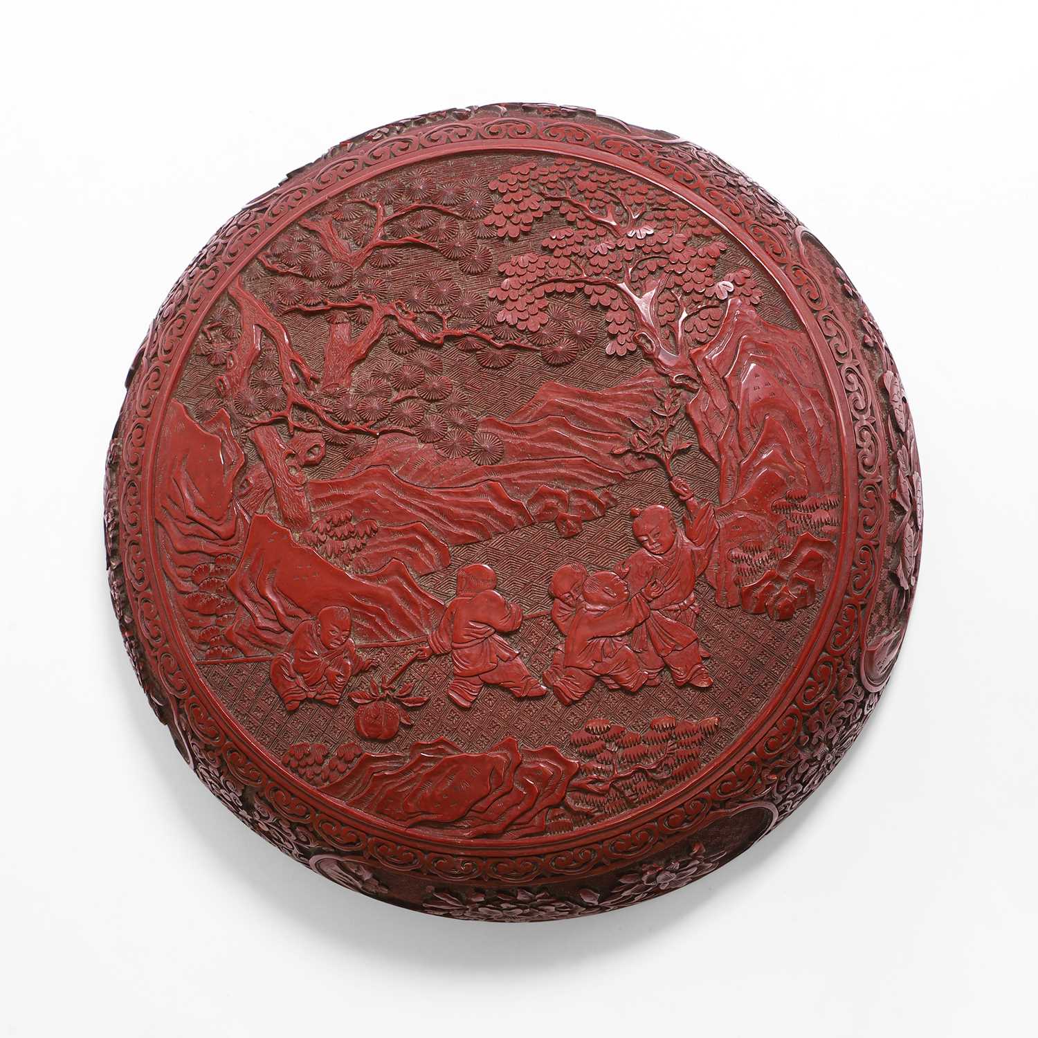 Lot 119 - A Chinese cinnabar lacquered box and cover