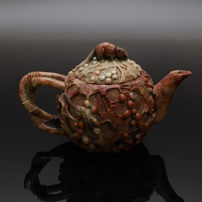 Lot 112 - A Chinese soapstone teapot and cover