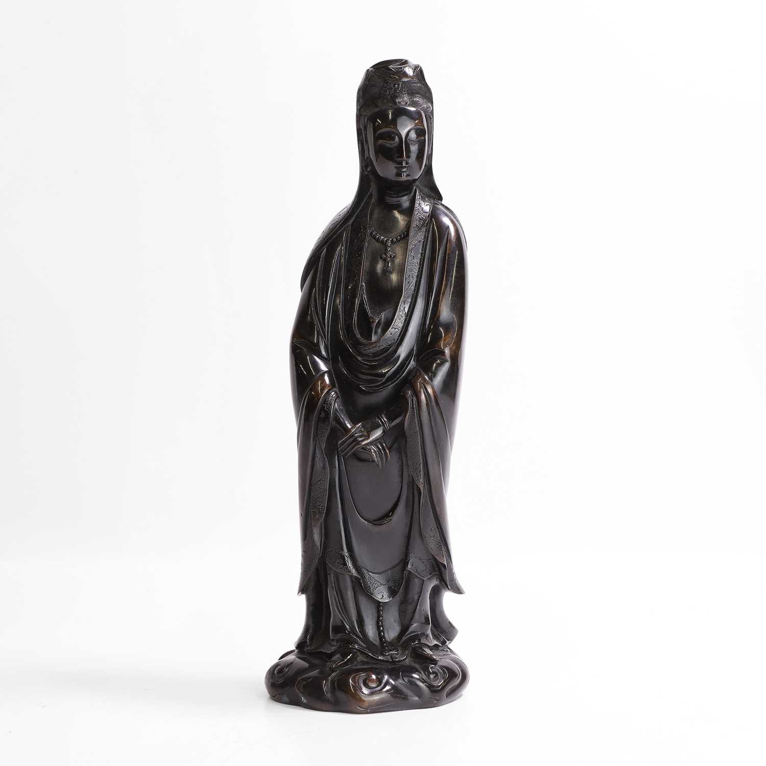 Lot 125 - A Chinese bronze figure