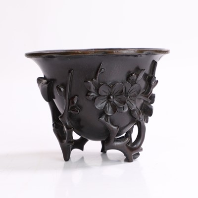 Lot 121 - A Chinese wood libation cup