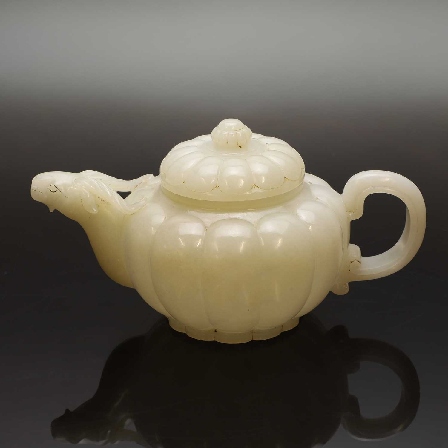 Lot 111 - A Chinese jade teapot and cover