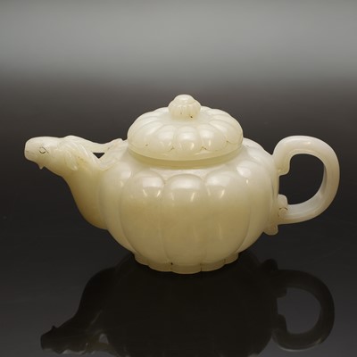 Lot 111 - A Chinese jade teapot and cover