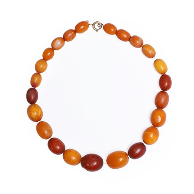Lot 1152 - A graduated single row butterscotch amber necklace