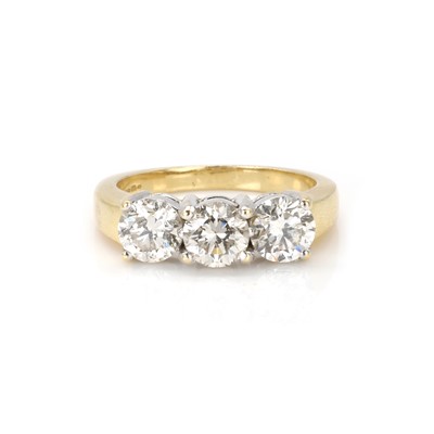 Lot 206 - An 18ct gold diamond three stone ring
