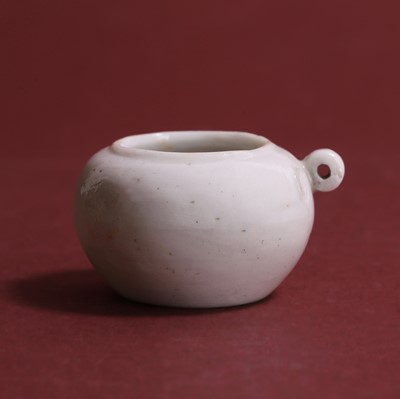 Lot 17 - A Chinese qingbai-glazed bird feeder