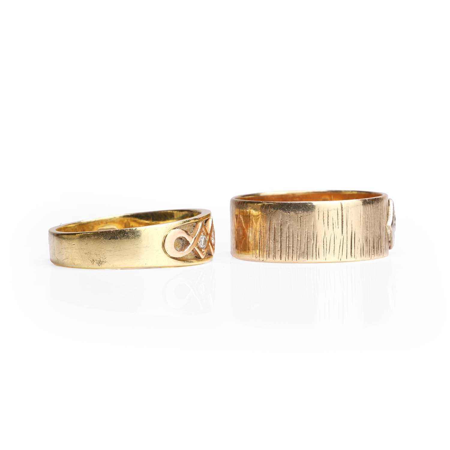 Lot 1163 - An 18ct two colour gold diamond ring and a