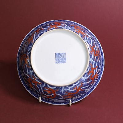 Lot 70 - A Chinese iron-red and underglaze blue dish