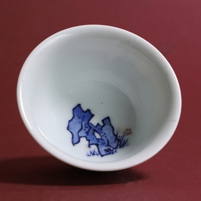 Lot 44 - A Chinese copper-red and underglaze-blue tea bowl