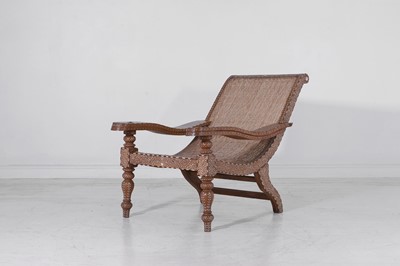 Lot 72 - A teak, bone and ebony plantation chair