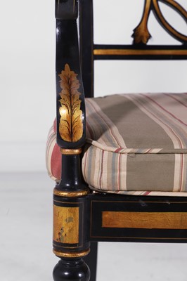 Lot 11 - A set of ten Regency-style black and gilt-painted wooden dining chairs