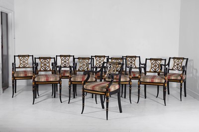 Lot 11 - A set of ten Regency-style black and gilt-painted wooden dining chairs