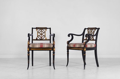 Lot 11 - A set of ten Regency-style black and gilt-painted wooden dining chairs