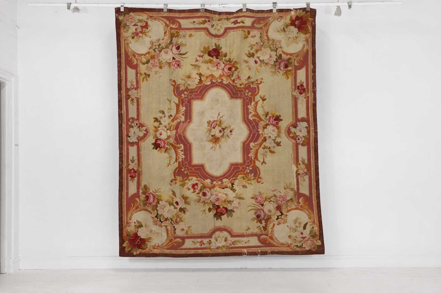 Lot 14 - An Aubusson wool rug