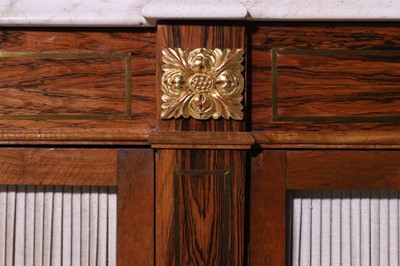 Lot 10 - A Regency-style rosewood and parcel-gilt side cabinet