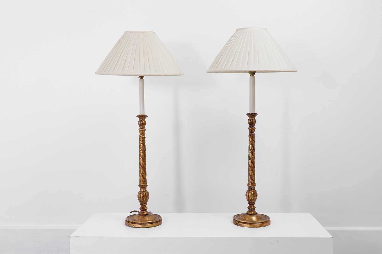Lot 8 - A pair of giltwood table lamps