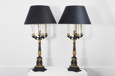 Lot 4 - A pair of large Empire-style gilt and patinated bronze candelabras