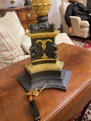 Lot 4 - A pair of large Empire-style gilt and patinated bronze candelabras