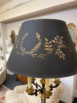 Lot 4 - A pair of large Empire-style gilt and patinated bronze candelabras