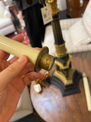Lot 4 - A pair of large Empire-style gilt and patinated bronze candelabras