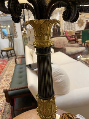 Lot 4 - A pair of large Empire-style gilt and patinated bronze candelabras