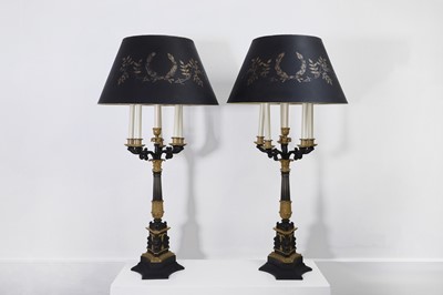 Lot 4 - A pair of large Empire-style gilt and patinated bronze candelabras