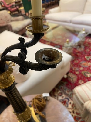 Lot 4 - A pair of large Empire-style gilt and patinated bronze candelabras